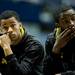 Michigan sophomore Trey Burke and fifth-year senior Corey Person listen to speeches at Crisler Arena on Tuesday, April 9. AnnArbor.com I Daniel Brenner